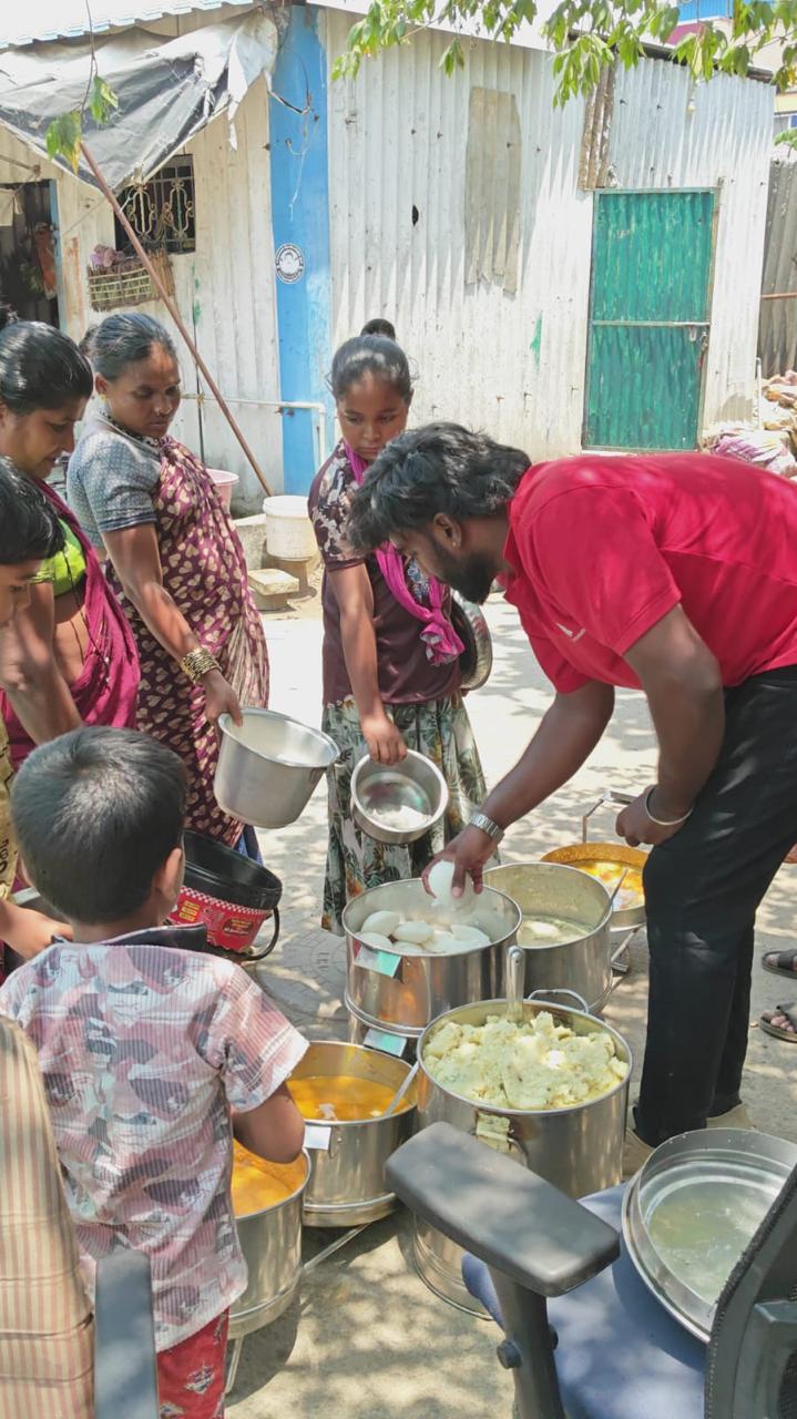 Volunteers serving hot meals